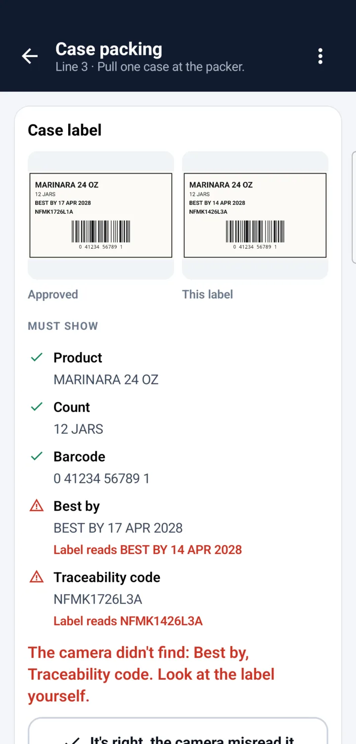 Case label check: the approved label beside the operator's photo, with the best-by and traceability code flagged because the label reads three days early